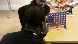 boys playing board games